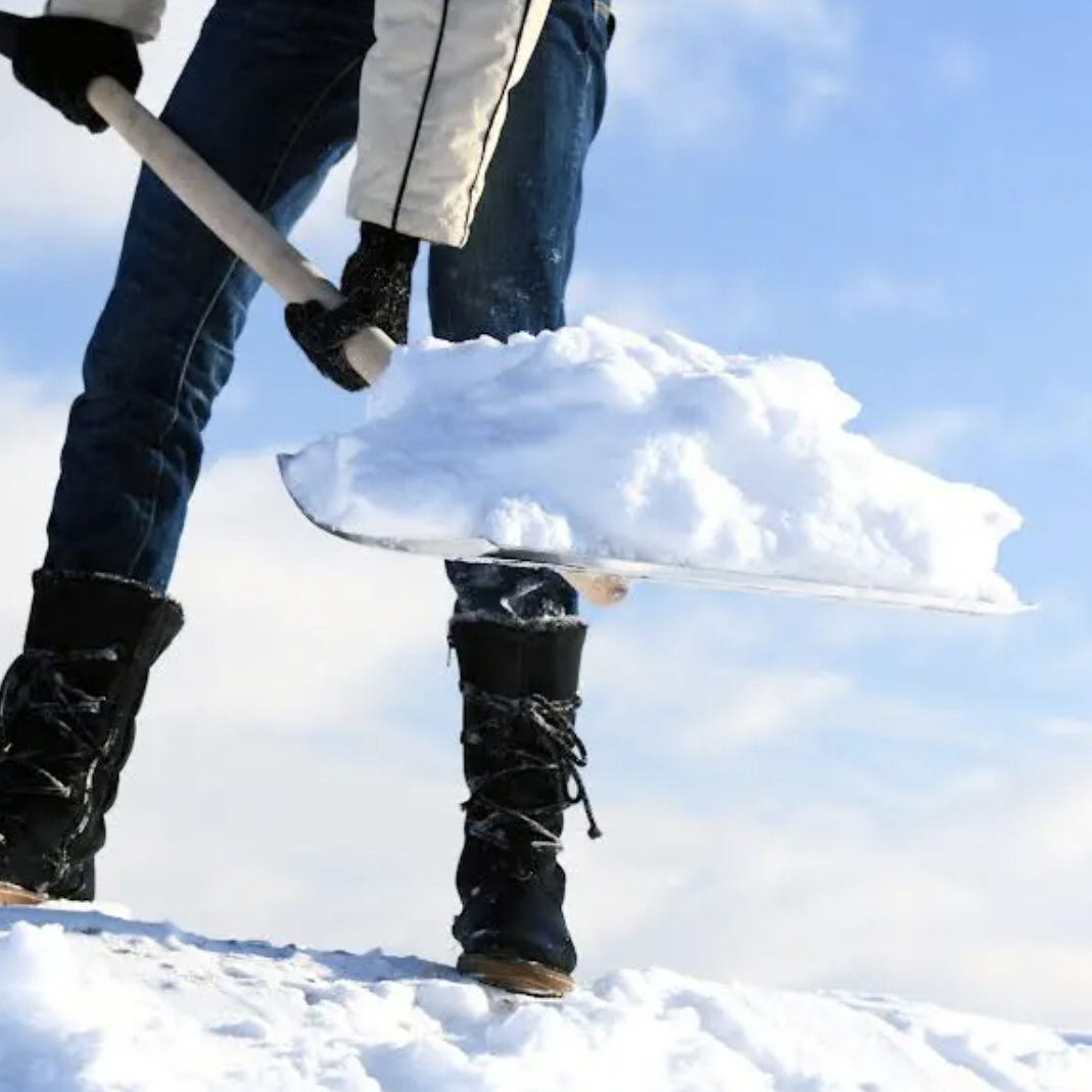 Person shoveling snow